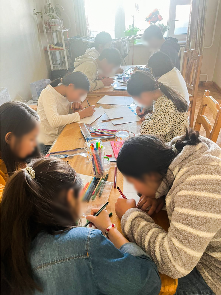 Art lesson at M NGO (blurred for privacy)